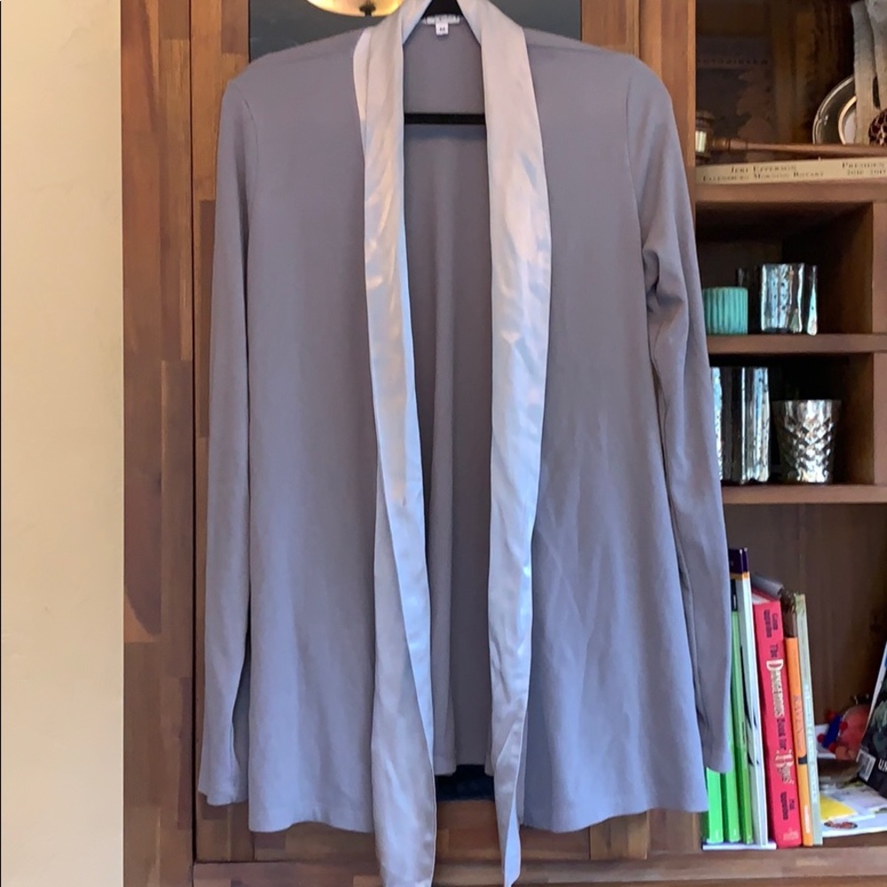 Soft cardigan with satin trim.